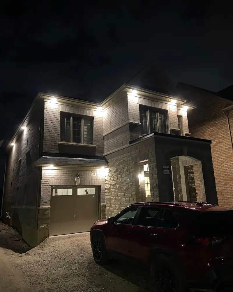 Full home exterior lighting at night